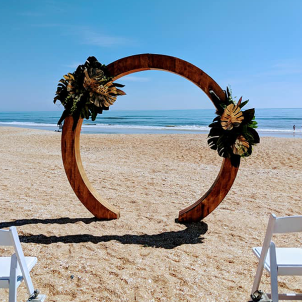 wooden circular arch decorated with florals